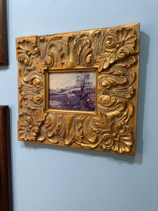 Hunt scene in gold frame